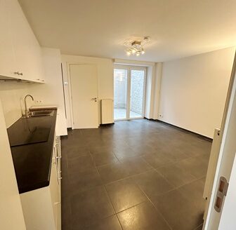 Charmant petit appartement 1ch avec cour dans maison Bruxelloise